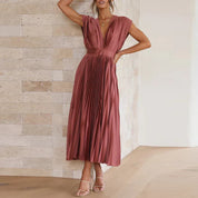 Daliah - Elegante Maxi-jurk met V-hals en Speelse Plooien