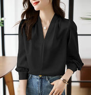 Stijlvolle V-hals damesblouses met trendy pofmouwen van ISHI