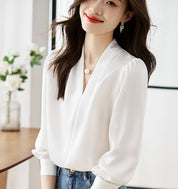 Stijlvolle V-hals damesblouses met trendy pofmouwen van ISHI