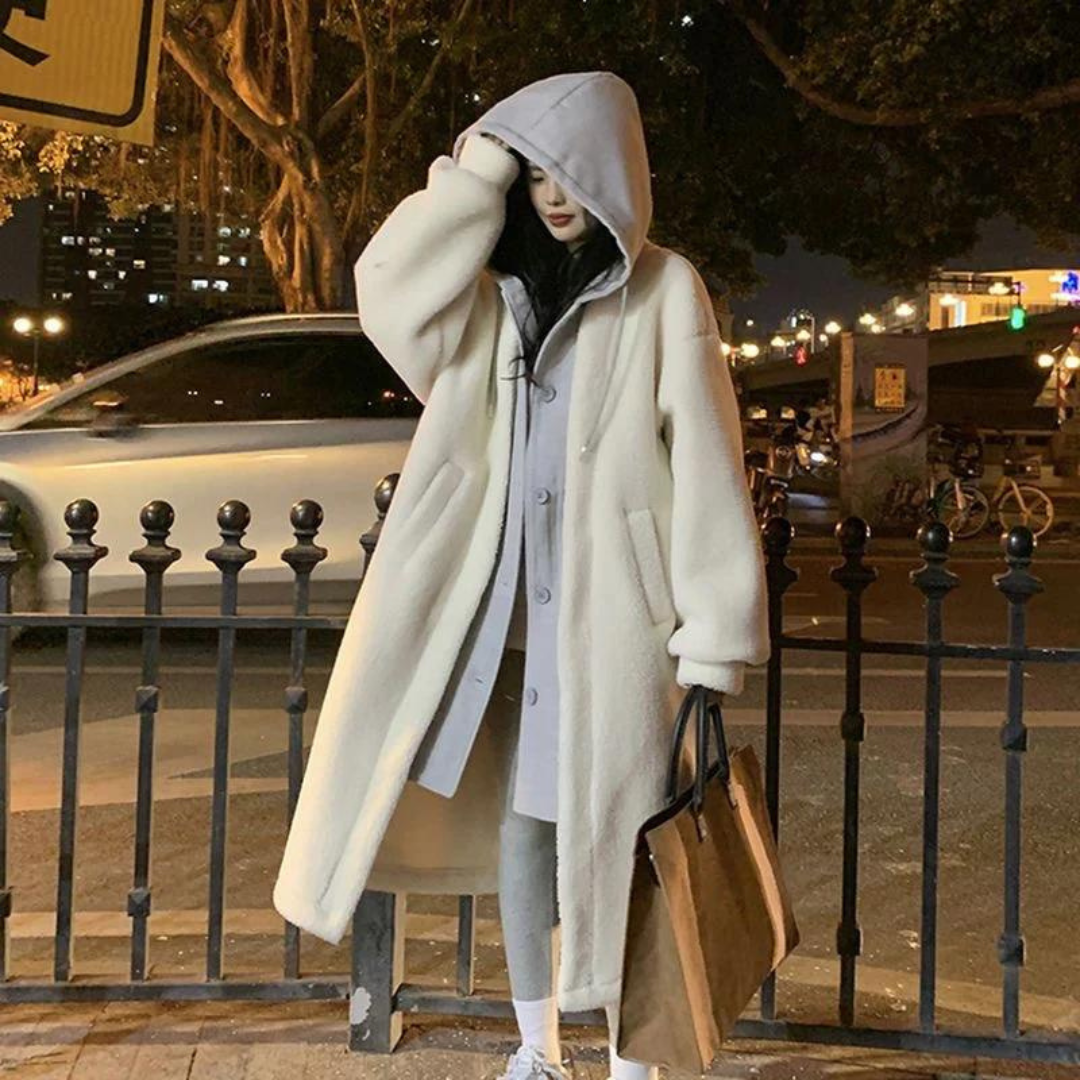 Dames winterjas met lange capuchon en oversized pasvorm | Knoopsluiting 0