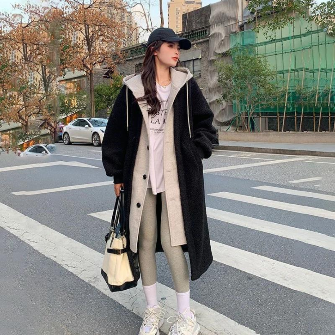 Dames winterjas met lange capuchon en oversized pasvorm | Knoopsluiting 1
