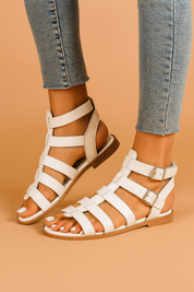 Dames gladiator sandalen met een bandjesontwerp, dubbele zijknoopsluitingen en open hiel voor een luchtige en modieuze zomerstijl.