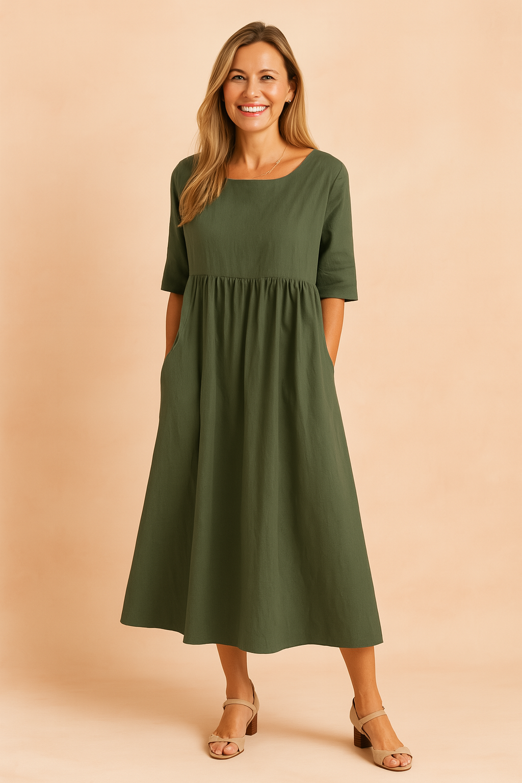Diepgroene midi-jurk met halve mouwen, rimpeling onder de buste en effen linnenachtige textuur.