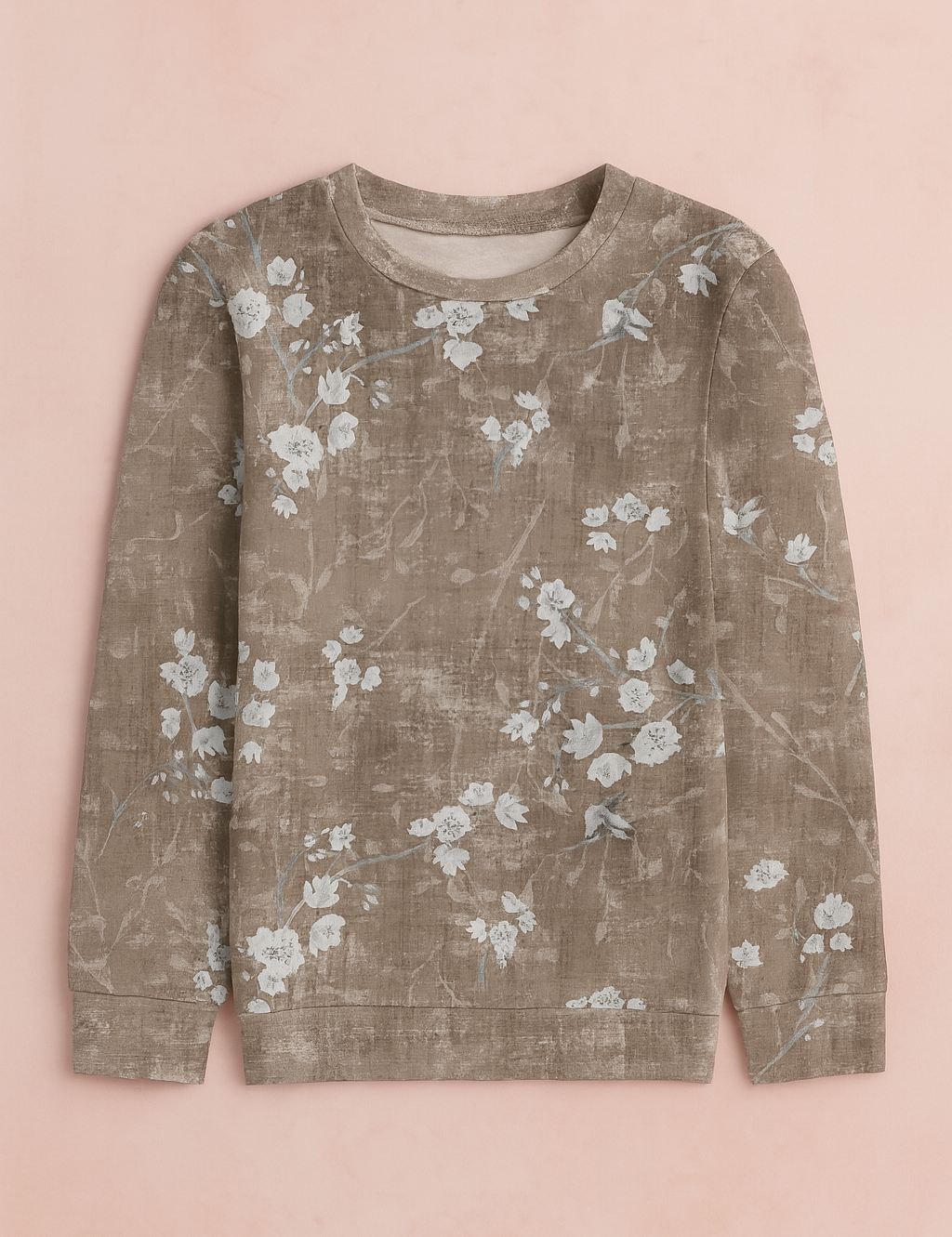 Taupekleurige gebreide top met lange mouwen, zachte bloemenprint, ronde hals en een relaxte pasvorm voor casual laagjes.