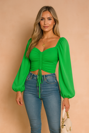 Groene cropped blouse met lange ballonmouwen en ruches aan de voorkant