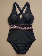 Zwart halter badpak met diepe V-hals en decoratieve leopardbanden rond de taille