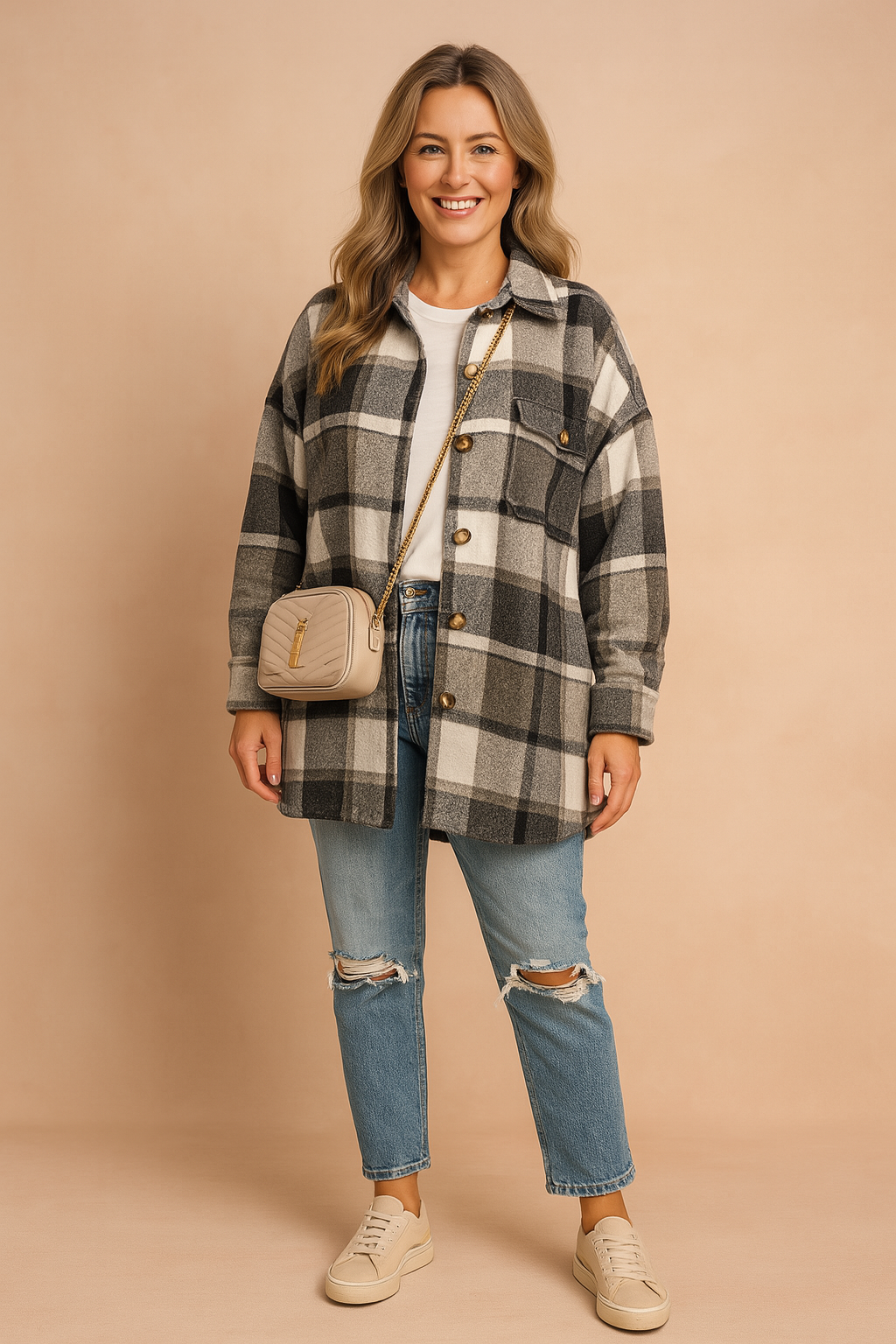 Zwart-wit flanellen shirt met grote ruit en verlaagde schouders, oversized pasvorm voor casual damesstijl.