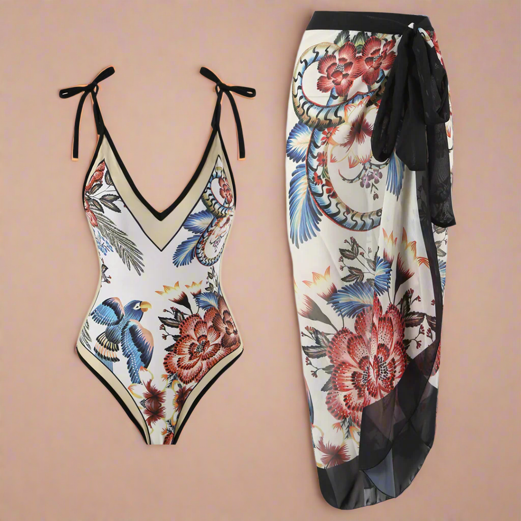 Zwempak met diepe V-hals en bloemenprint met papegaaien, gecombineerd met transparante wikkelrok met dezelfde print