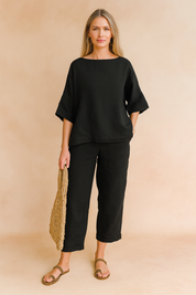 Zwarte linnen blouse met minimalistisch design en oversized pasvorm, luchtige basic voor elke garderobe
