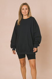 Comfortabele zwarte oversized trui met ronde hals en verlaagde schoudernaden